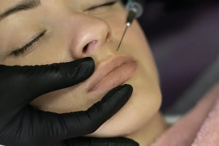 Botox or Dermal Fillers. injecting botox and dermal filler into the lips